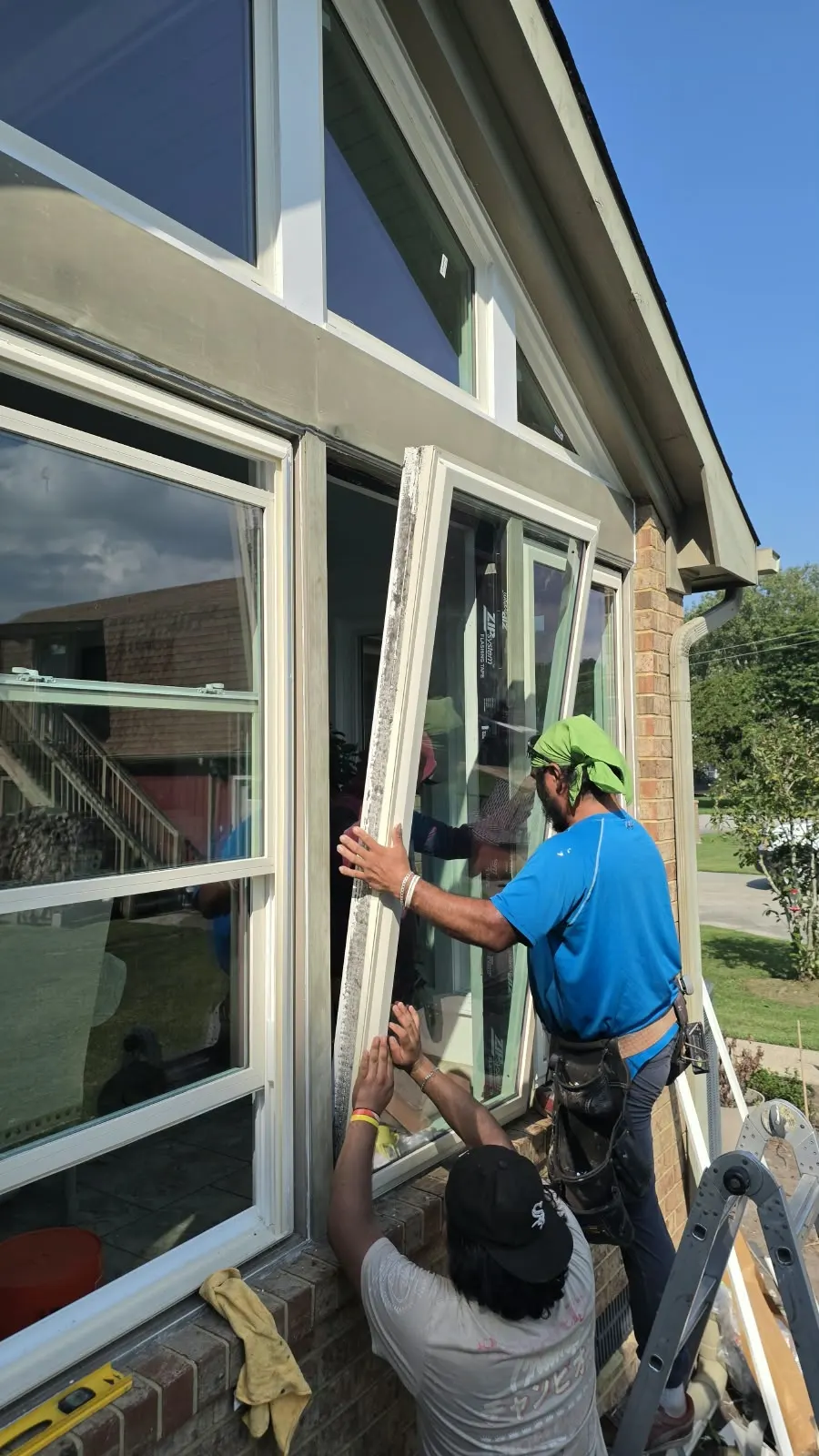 757 Contracting Services crew installing a window in Hampton, VA