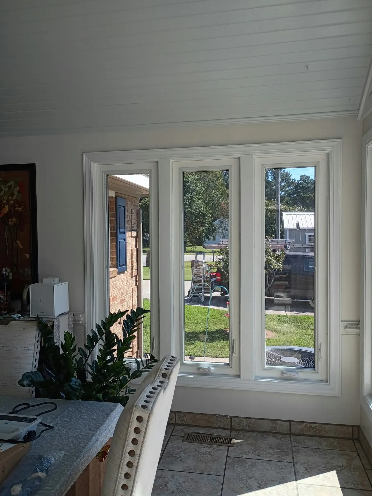 Interior view of new tall windows in a Hampton, VA sunroom