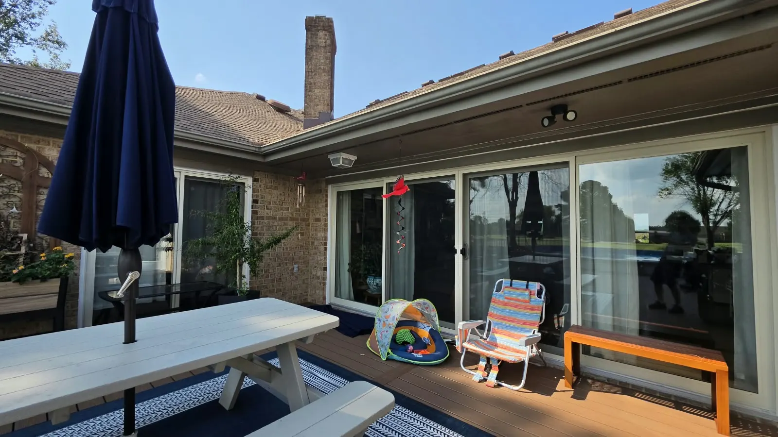 Covered patio and deck with sliding doors in Hampton, VA