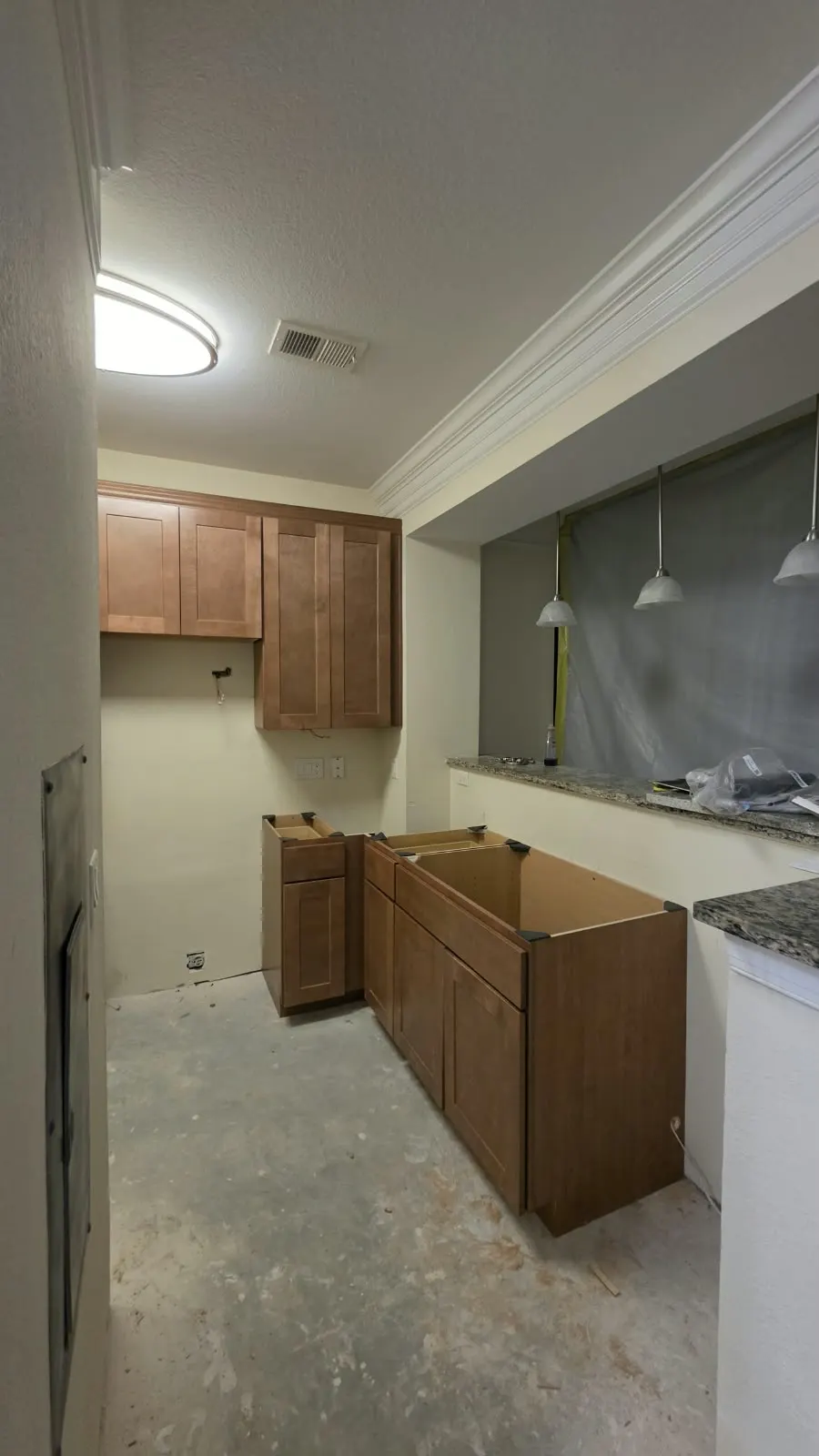 Kitchen cabinet installation in progress in Hampton, VA