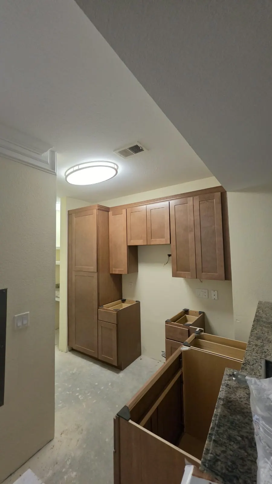 Shaker kitchen cabinets being installed in Hampton, VA