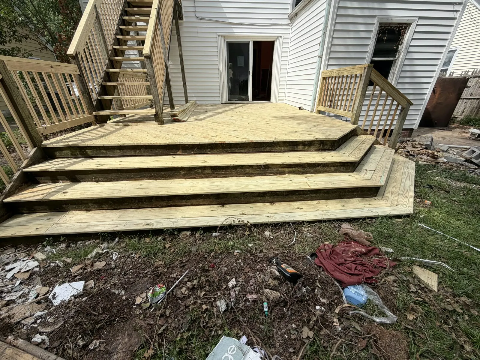 New wide pressure-treated wood deck steps built in Hampton, VA
