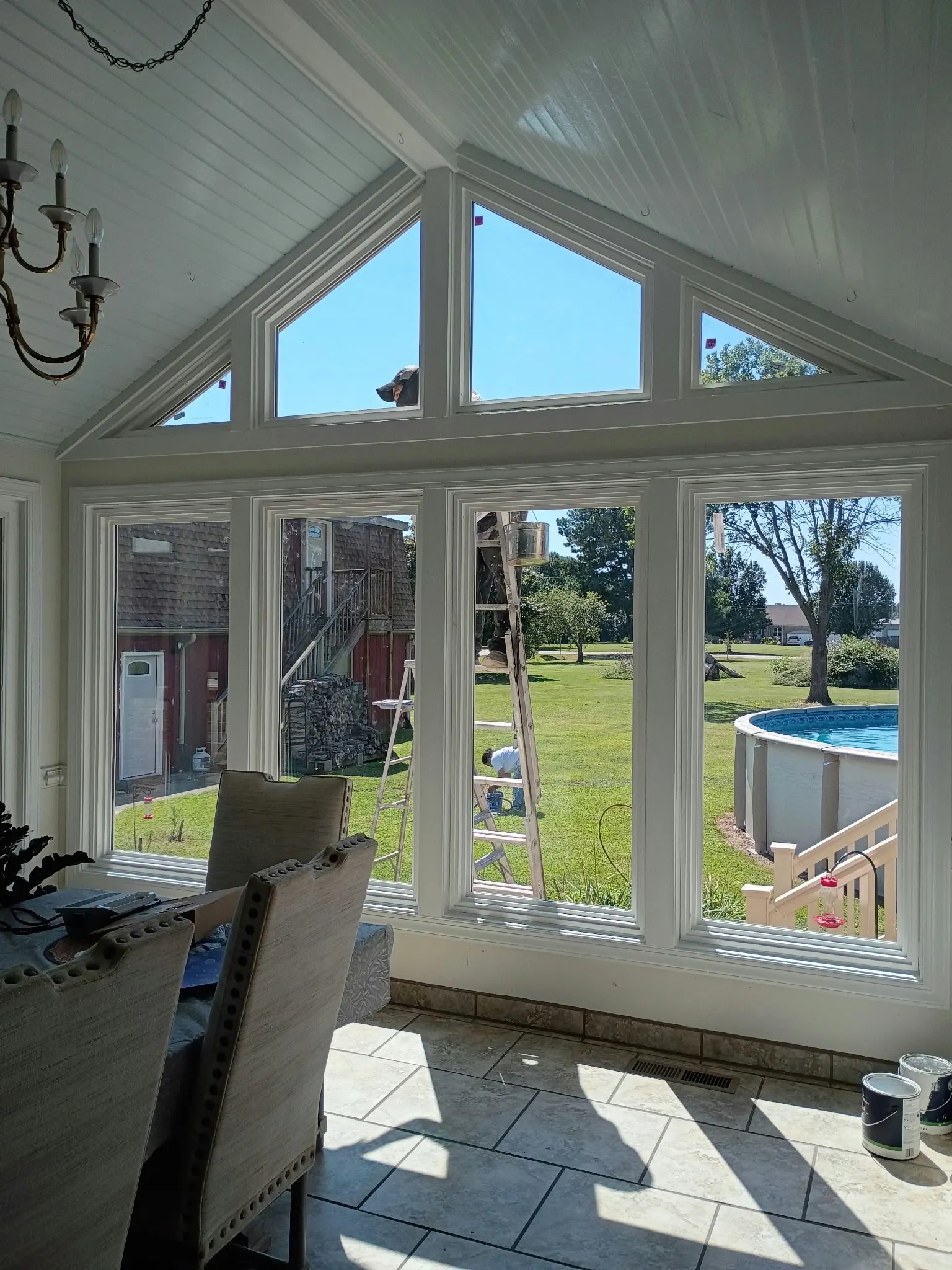Sunroom window wall above a tile floor in Hampton, VA
